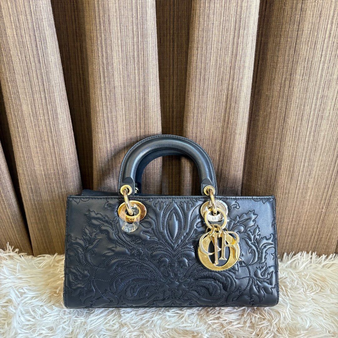 DIOR D-JOY EMBROIDED BLACK GHW (Category: Luxury Bags & Wallets) located in Manila. Submitted by cjv.luxury (Listing ID 1422949763, Image 2). Description: CJV-2565 Inclusions: Entrupy, Card, Booklet, 2 Straps & Dustbag ✅ All items are available for 3 months layaway ✅ For cash buyers, items are negotiable. Just shoot your ✅ Trades are welcome, you can bring other luxury bags/items that you wish to sell and we can convert it to store credit. 💯 We 