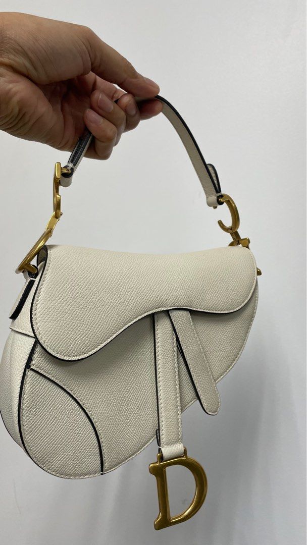 DIOR Saddle Mini white leather bag (Category: Luxury Bags & Wallets) located in Manila. Submitted by luxemax_09 (Listing ID 1422944455, Image 3). Description: .