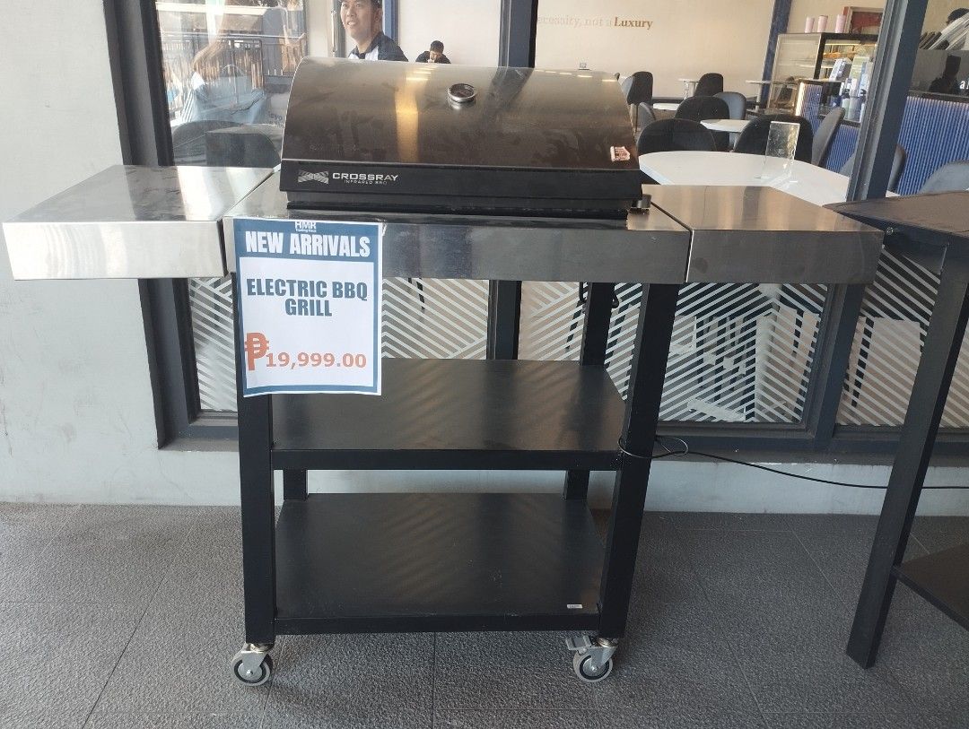 Electric BBQ Grill (Category: BBQ, Grills & Hotpots) located in Caloocan City. Submitted by dhiony (Listing ID 1422909860, Image 1). Description: - Electric BBQ grill - Stainless steel surface - Black frame - Two side tables - Two shelves for storage - On wheels for easy movement - Price: ₱19,999.00.
