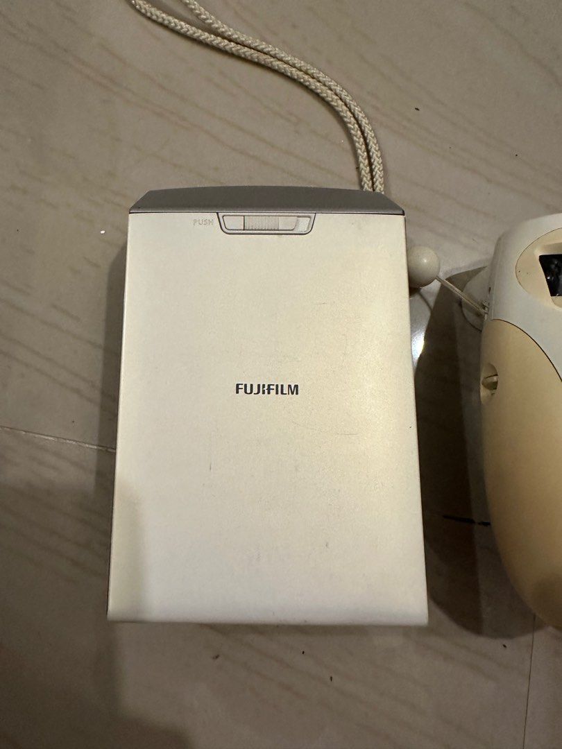 Fujifilm Instax Mini 7S and Share SP-2 (Category: Cameras) located in Marilao. Submitted by practicali (Listing ID 1423032192, Image 2). Description: Selling my preowned Instax cameras Take all .