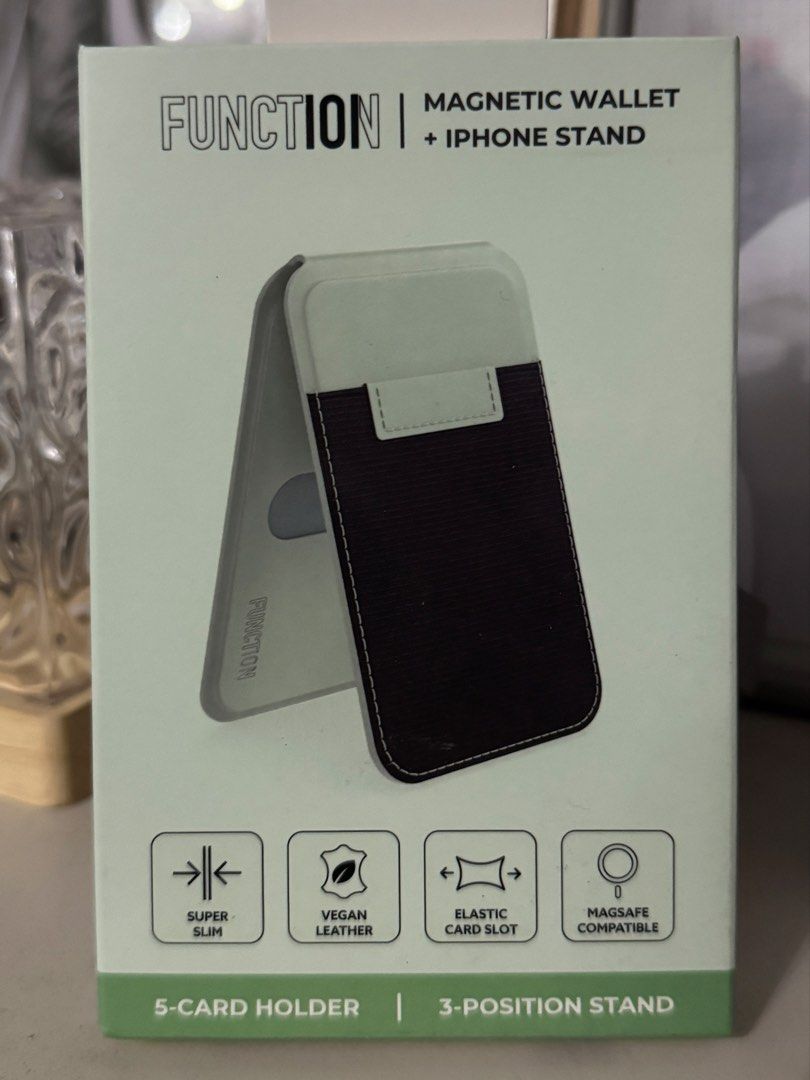 Function Magnetic Wallet and iPhone stand (Category: Mounts & Holders) located in Manila. Submitted by UnlimitedBagsPH (Listing ID 1423036010, Image 1). Description: Magnetic Wallet iPhone stand 5 card holder 3 position stand .