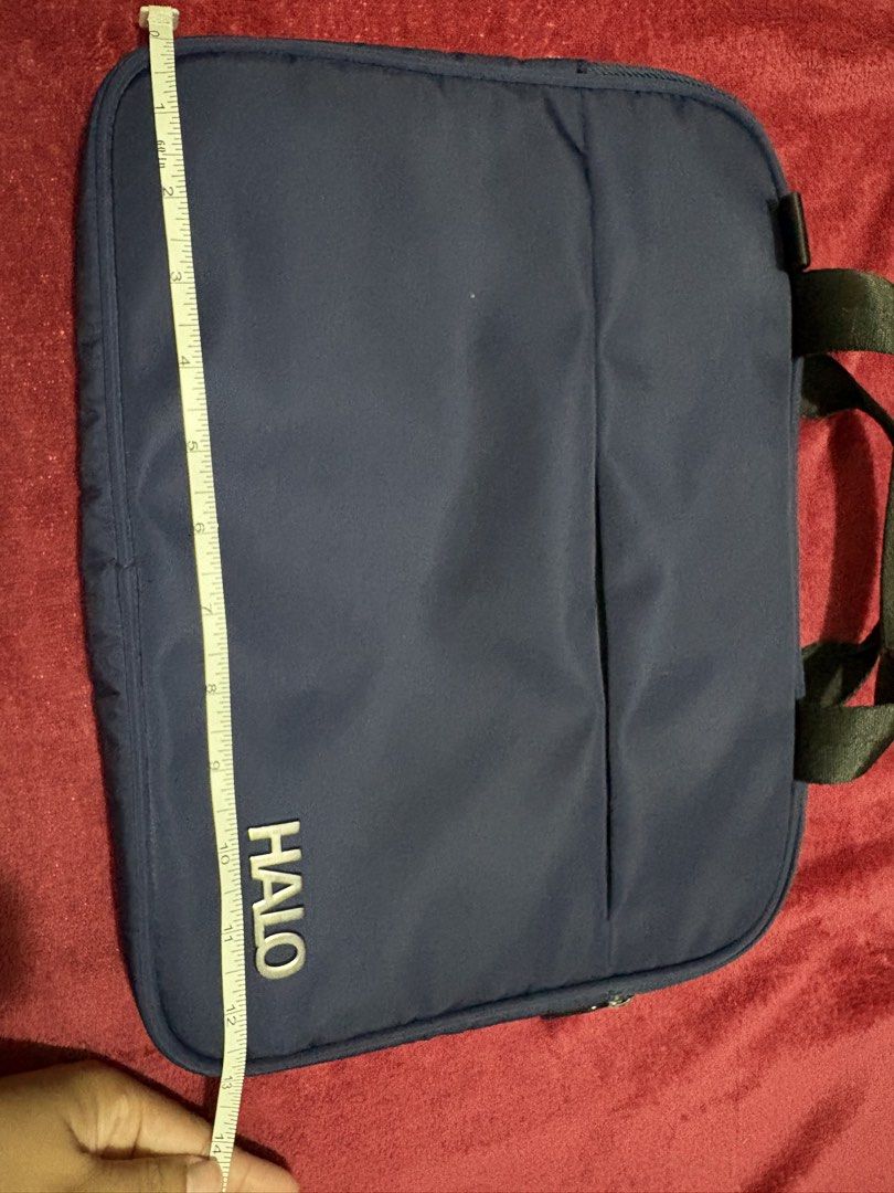 Halo Laptop Bag - Navy Blue (Category: Laptop Bags & Sleeves) located in Caloocan City. Submitted by mommyk2026 (Listing ID 1422949946, Image 2). Description: Halo Laptop Bag in Navy Blue Length 13 inches, height 10 inches Preloved Negotiable RFS: Decluttering Payment via Gcash/ Online bank transfer Shipped from South Caloocan Shipping fee c/o buyer.