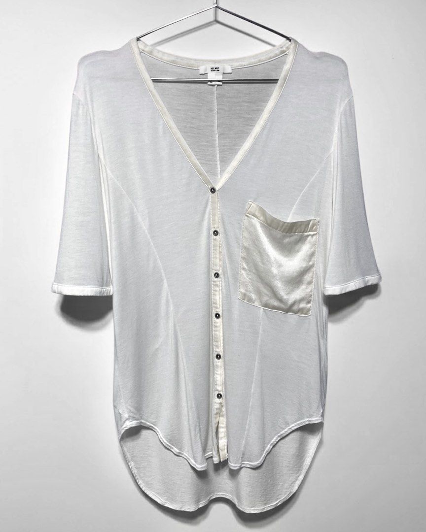 Helmut Lang - Liquid Satin Pocket V-Neck Top (Category: Blouses) located in Angeles City. Submitted by crushedgems (Listing ID 1423018354, Image 1). Description: id: Helmut Lang - Liquid Satin Pocket V-Neck Top Featuring a distinct V-neckline framed by refined satin trim that continues down the button placket, the design is accented by a contrasting satin chest pocket on the left side. Made from a soft, lightweight blend of modal and cashmere, wi