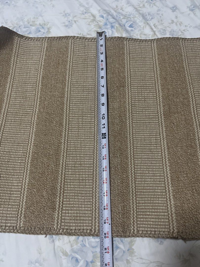 IKEA KLEJS Rug (Category: Carpets, Mats & Flooring) located in San Juan City. Submitted by iambernie (Listing ID 1422997667, Image 3). Description: - IKEA KLEJS rug - Striped pattern: Brown and beige - Size: Approximately 50cm x 80cm - Material: Jute and cotton - Origin: Made in India - Care instructions on tag - Suitable for various spaces - Never used, just kept in cabinet .