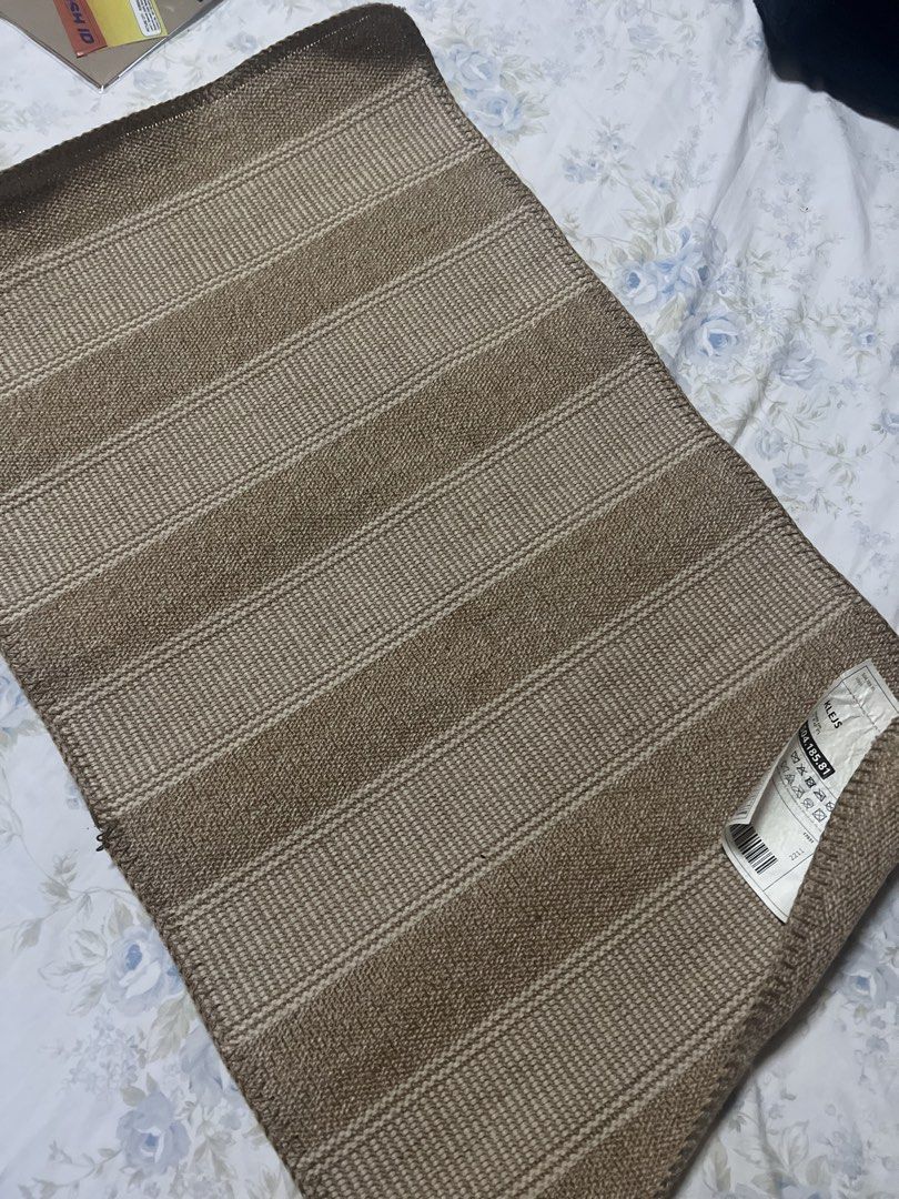 IKEA KLEJS Rug (Category: Carpets, Mats & Flooring) located in San Juan City. Submitted by iambernie (Listing ID 1422997667, Image 1). Description: - IKEA KLEJS rug - Striped pattern: Brown and beige - Size: Approximately 50cm x 80cm - Material: Jute and cotton - Origin: Made in India - Care instructions on tag - Suitable for various spaces - Never used, just kept in cabinet .