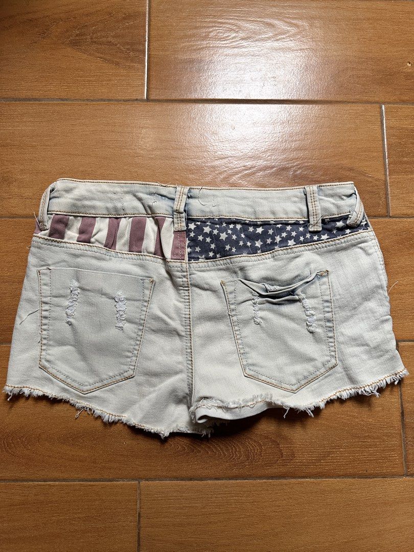 Iris Jeans American Flag Y2K Shorts (Category: Shorts) located in Caloocan City. Submitted by yoonstar (Listing ID 1422966269, Image 2). Description: ☆American flag design ☆Light wash denim ☆Distressed details and raw hem ☆Best fits XS-M (26-27 inches) ☆No "when worn" photos.