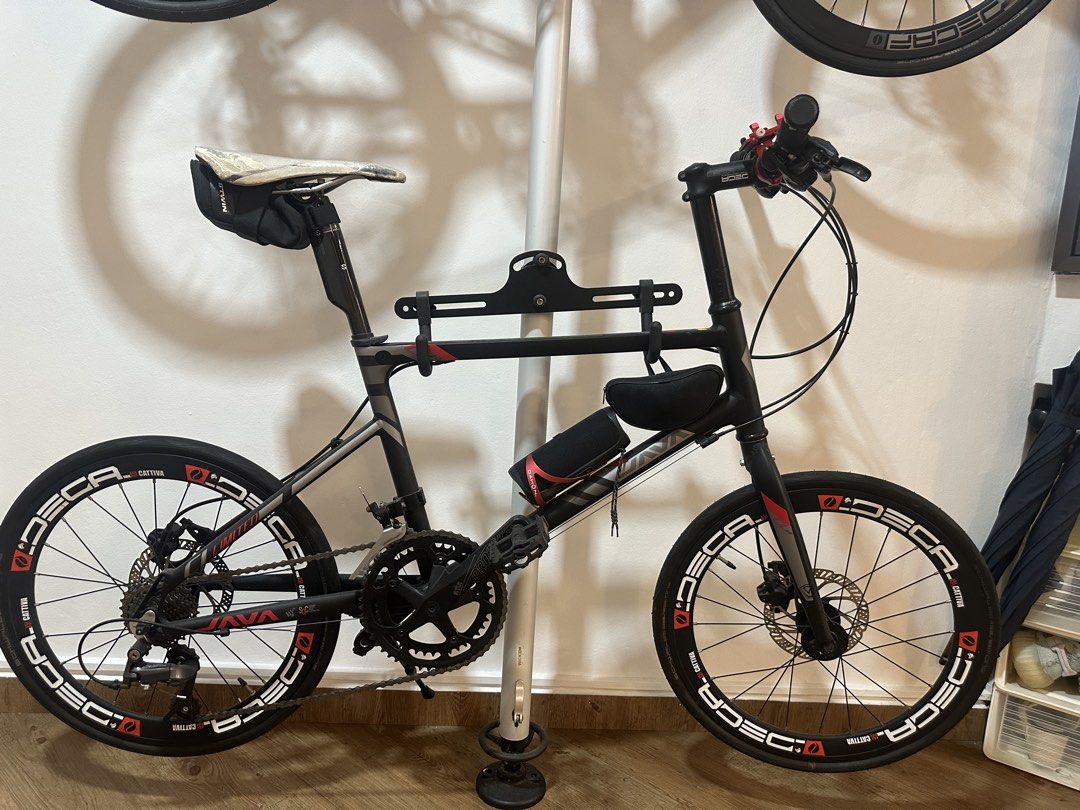 Java Bike (Category: Bicycles) located in Singapore. Submitted by vinnnn17 (Listing ID 1423005295, Image 1). Description: - Stylish black and silver design - Equipped with disc brakes - Includes saddle bag - Features water bottle holder - Ideal for commuting and leisure rides - Ready to ride!.