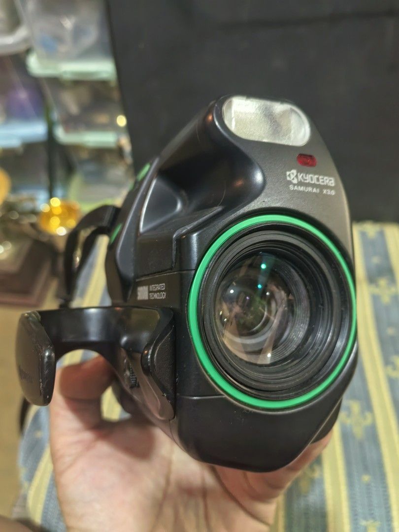 Kyocera Samurai X3.0 Half Frame 35mm Film Camera (Category: Cameras) located in Cebu City. Submitted by dudes_villanueva (Listing ID 1422934475, Image 2). Description: Kyocera Samurai X3.0 Half Frame 35mm Film Camera Note: Tested Functional. All sales final and non-refundable. Battery not included for testing and demo only. Working Flash. Clear Lens. Shutter Working. Dummy roll tested. No sample output. 📌A rare half-frame 35mm film camera releas