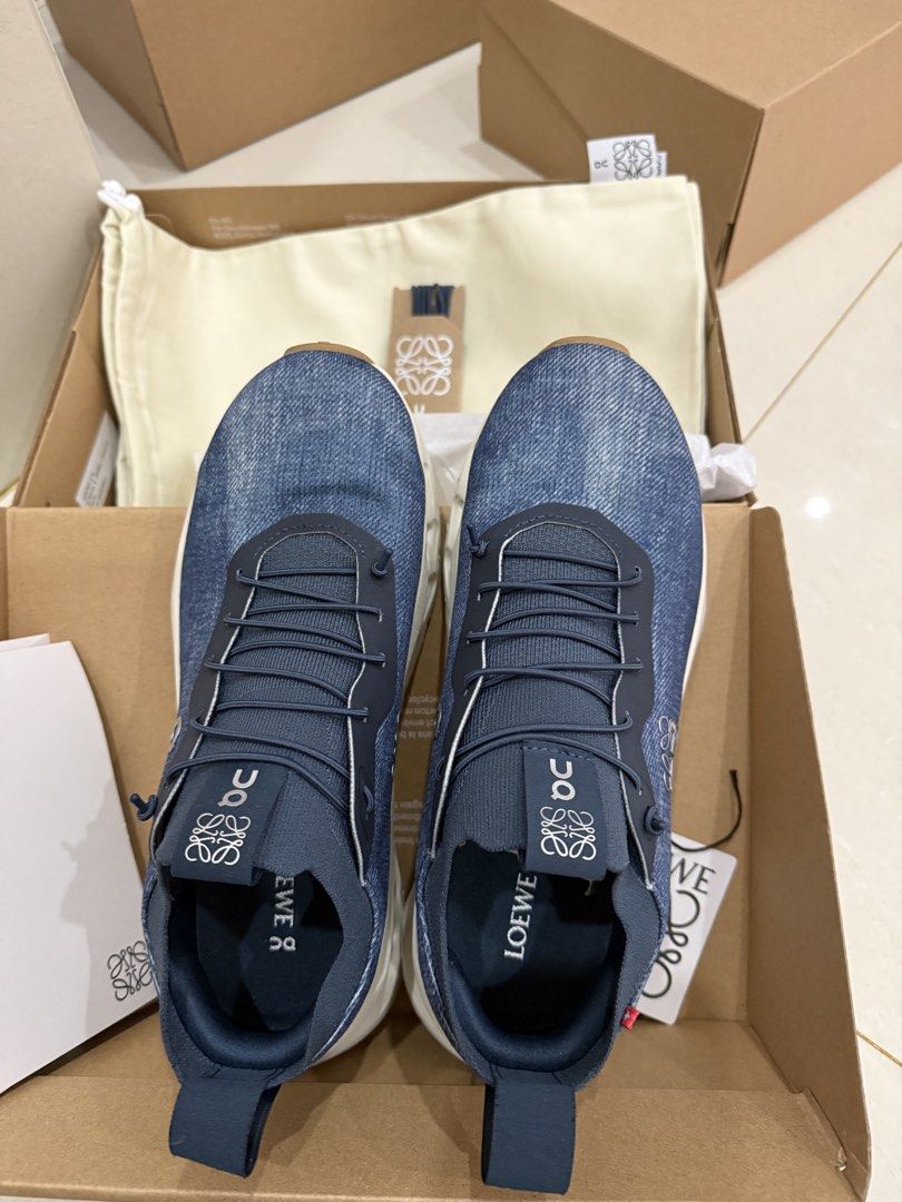 Loewe x On Cloudtilt Denim Sneakers (Category: Sneakers) located in Manila. Submitted by act23 (Listing ID 1422968677, Image 2). Description: AUTHENTIC - Loewe x On Cloudtilt sneakers - Denim upper - Loewe logo on side and tongue - Includes extra laces, dust bag, and original box - White sole - Blue color scheme Likenew Condition.