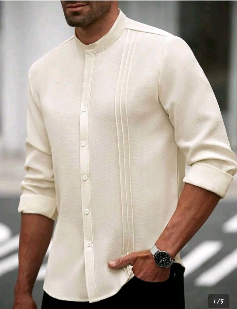 Men's Linen Mandarin Collar Shirt (Category: Tshirts & Polo Shirts ) located in Manila. Submitted by happyhawk-58a3 (Listing ID 1422939685, Image 1). Description: - Cream-colored men's shirt - Mandarin collar - Button-down front - Long sleeves with buttoned cuffs - Decorative pleats - Textured, linen-like fabric - Perfect for smart casual wear.