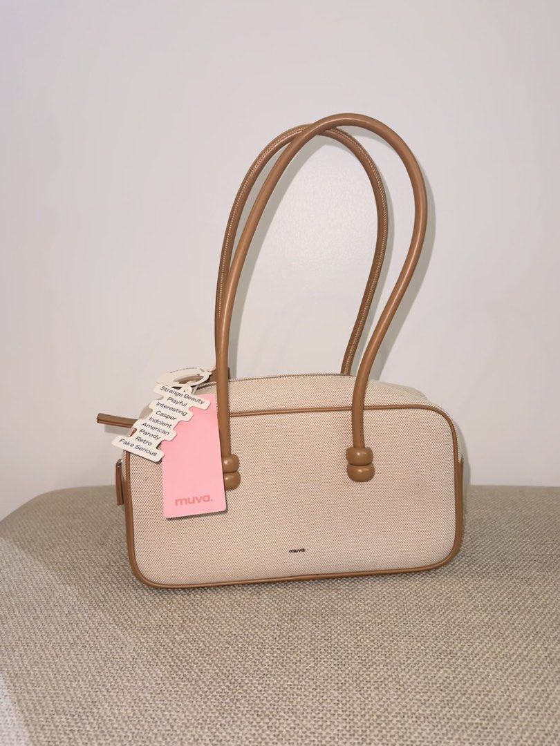 Muva East West Bag (Category: Luxury Bags & Wallets) located in Makati City. Submitted by shopmycloset106 (Listing ID 1423032736, Image 1). Description: Muva Canvass East West Bag Made with genuine cowhide leather Complete with tags and dust bag Used 2x only Bought for PhP6,500 from Bangkok Selling low at PhP4,000.