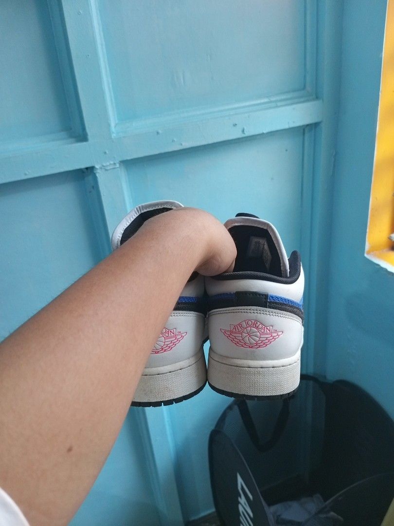 Nike Air Jordan 1 Low Formula 23 (Category: Sneakers) located in Manila. Submitted by abimow (Listing ID 1422914378, Image 2). Description: - White, blue, and black color scheme - Features the Nike swoosh and Jordan logo - Black laces and outsole - White midsole - Included another laces - Like new authentic bought from nike store no box because tinapon ko na. pwede ibalik pag peke 😆.