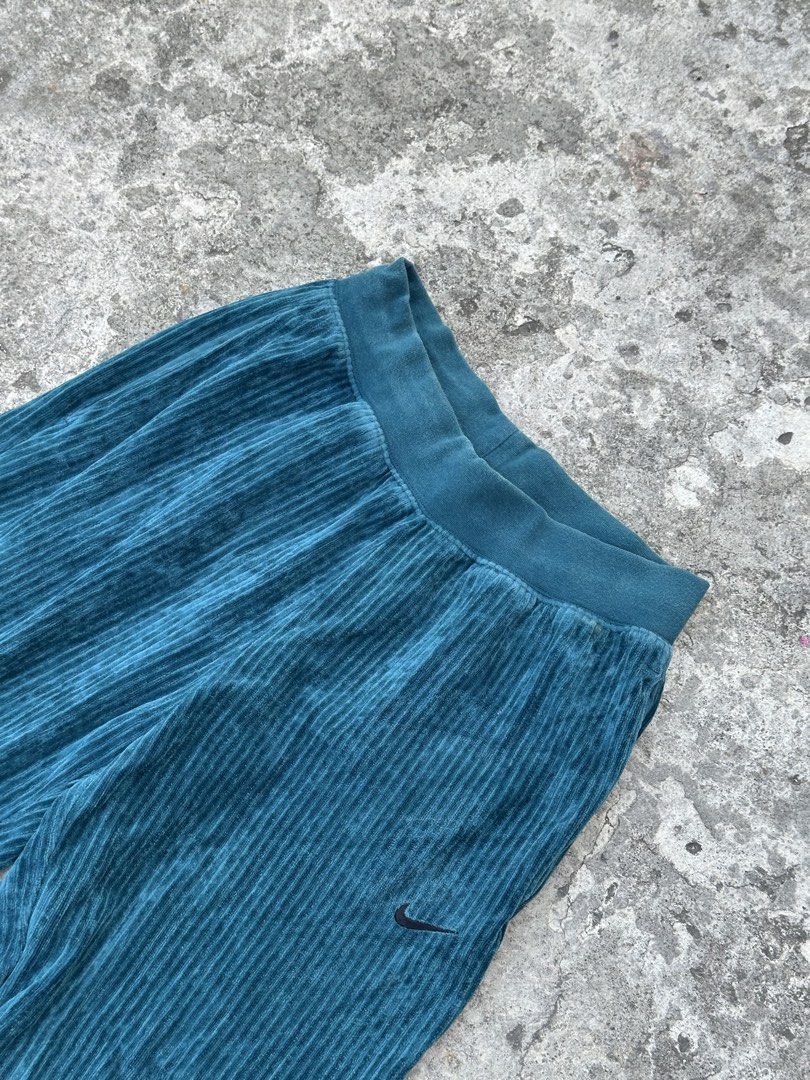 Nike Corduroy Pants XS (Category: Other Bottoms) located in Bago City. Submitted by thekasproject (Listing ID 1423016208, Image 2). Description: Teal corduroy pants from Nike. Features an elastic waistband and cuffs. Includes a small Nike logo on the front. Xs on tag waistline is 26-30 680 freeshipping nationwide.