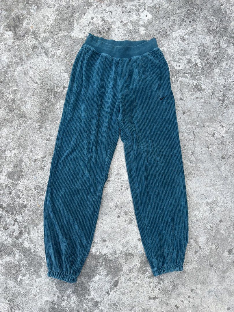 Nike Corduroy Pants XS (Category: Other Bottoms) located in Bago City. Submitted by thekasproject (Listing ID 1423016208, Image 1). Description: Teal corduroy pants from Nike. Features an elastic waistband and cuffs. Includes a small Nike logo on the front. Xs on tag waistline is 26-30 680 freeshipping nationwide.