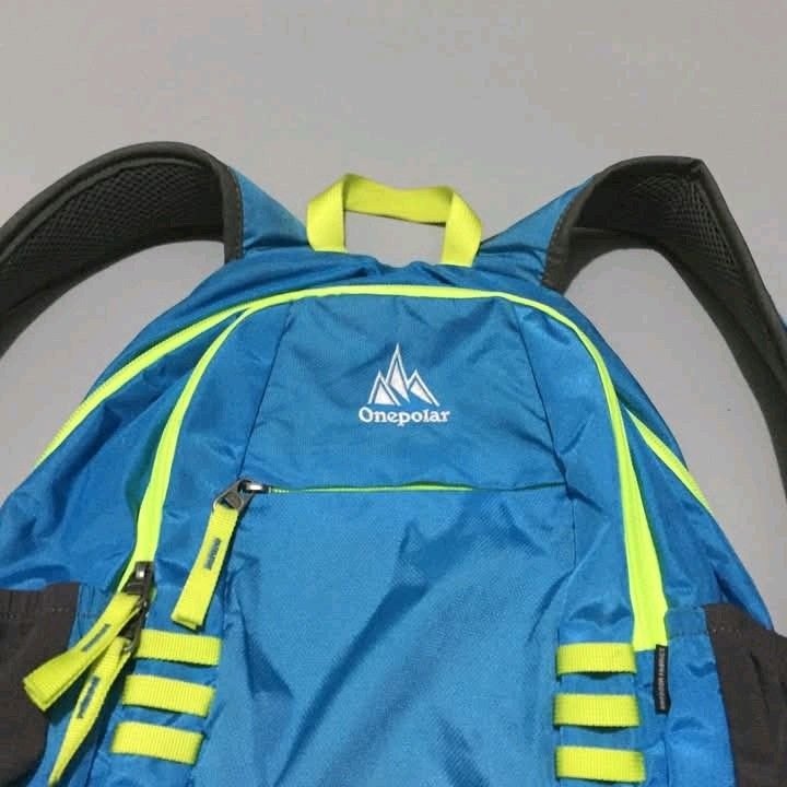 Onepolar Backpack - Blue and Yellow (Category: Backpacks) located in Calbayog City. Submitted by taking-candy.ph (Listing ID 1422905636, Image 2). Description: - Onepolar backpack with a striking blue and yellow color scheme. - Features a spacious main compartment and a convenient front pocket. - Comfortable design with adjustable straps, a padded back, and a top handle. - Includes a waist strap for added support. - Designed with the "Born for Ad