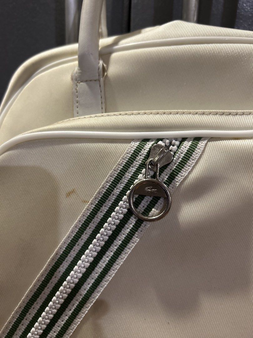 Original Lacoste Small Bowling Bag – Stark White (Category: Luxury Bags & Wallets) located in Quezon City. Submitted by clearshelf (Listing ID 1423019629, Image 2). Description: Original Lacoste Small Bowling Bag – Stark White Authentic, good preloved condition. No damage, all zippers OK. Has minor stains, light discoloration, and small storage marks — all shown clearly in photos..