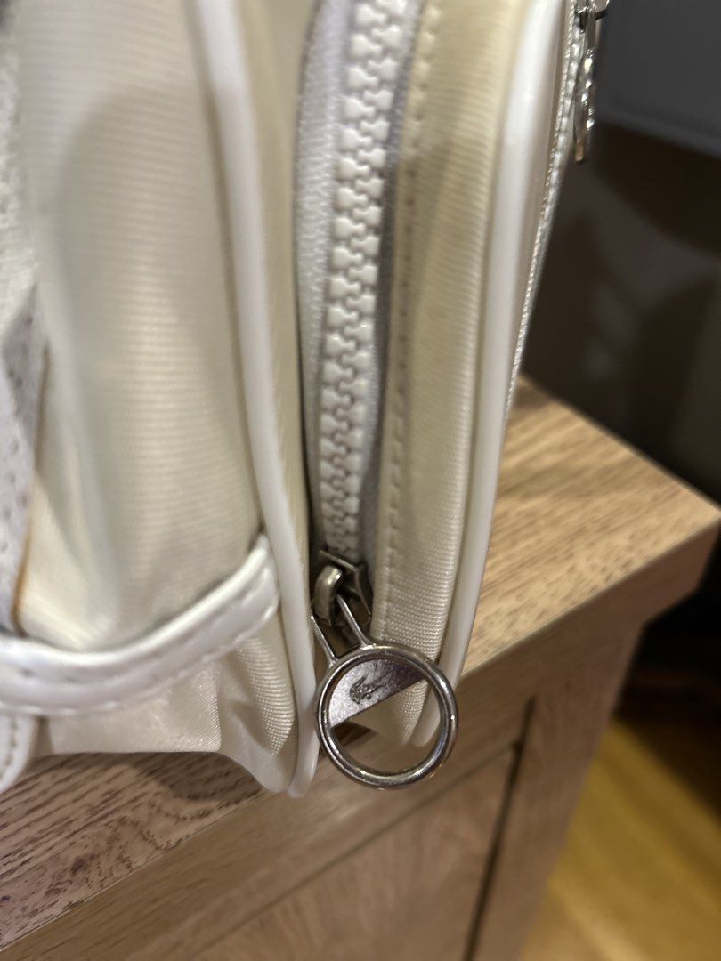 Original Lacoste Small Bowling Bag – Stark White (Category: Luxury Bags & Wallets) located in Quezon City. Submitted by clearshelf (Listing ID 1423019629, Image 3). Description: Original Lacoste Small Bowling Bag – Stark White Authentic, good preloved condition. No damage, all zippers OK. Has minor stains, light discoloration, and small storage marks — all shown clearly in photos..