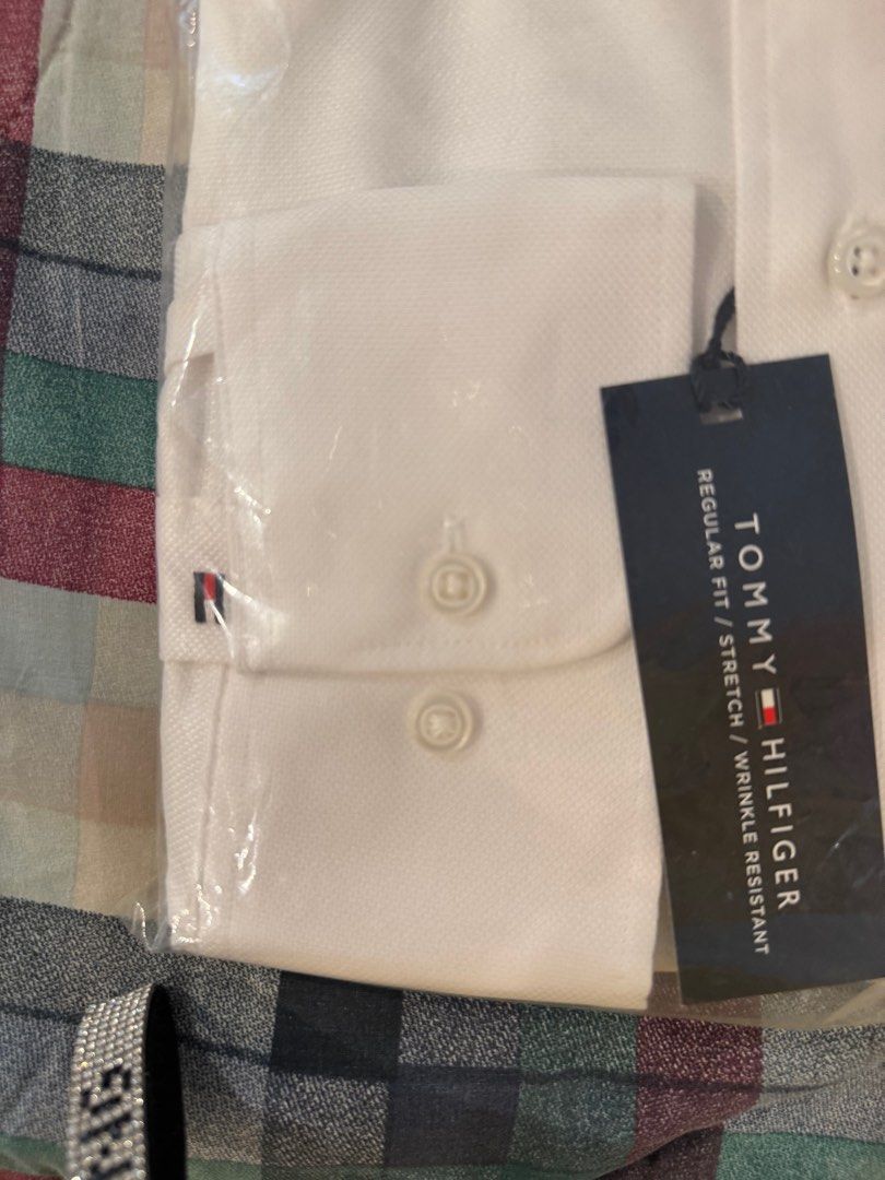 Original Tommy Hilfiger shirt (Category: Formal Shirts) located in Manila. Submitted by goinggreener (Listing ID 1422970478, Image 3). Description: Original Tommy H - Nice white, cottony shirt, stretch and wrinkle-free, for your special occasions, Message or text me for questions. NEGOTIABLE to the serious buyer. .