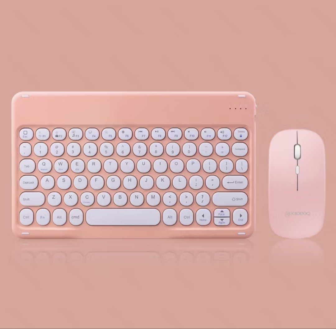Pink Wireless Keyboard and Mouse Set (Category: Computer Keyboard) located in Mansalay. Submitted by declutterandco (Listing ID 1422909492, Image 2). Description: RFS: wanna upgrade:)) - Pink wireless keyboard and mouse combo - Compact keyboard layout with white keys - Simple, matching pink mouse - Designed for portability - Ideal for use with tablets and laptops.