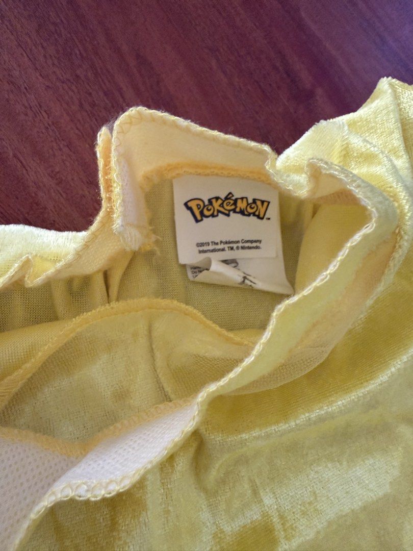 Pokemon Pikachu Child Costume (Category: Babies & Kids Fashion) located in Makati City. Submitted by larcie (Listing ID 1422963085, Image 3). Description: - Pokemon Pikachu costume - Yellow dress with long sleeves and skirt only -2facial sticker - Size: M (7-8) -bought in US used twice only.