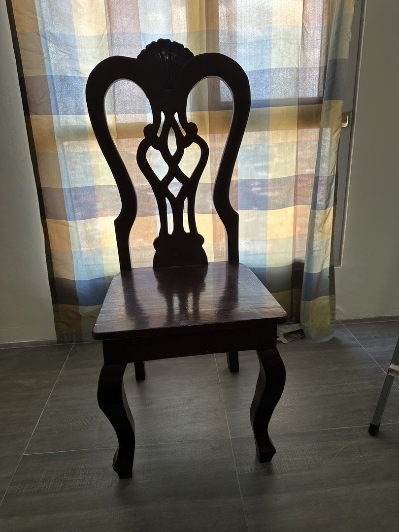 Pre-Loved Wooden Kabisera Dining Chair (Category: Chairs) located in Quezon City. Submitted by khaleesitargaryen_08 (Listing ID 1422936649, Image 1). Description: Loc: Avida Tower San Lazaro near UST One (1) Antique Kabisera Wooden Chair 17.5x16x44in. - Curved legs - Classic design - Adds sophistication to your dining area.