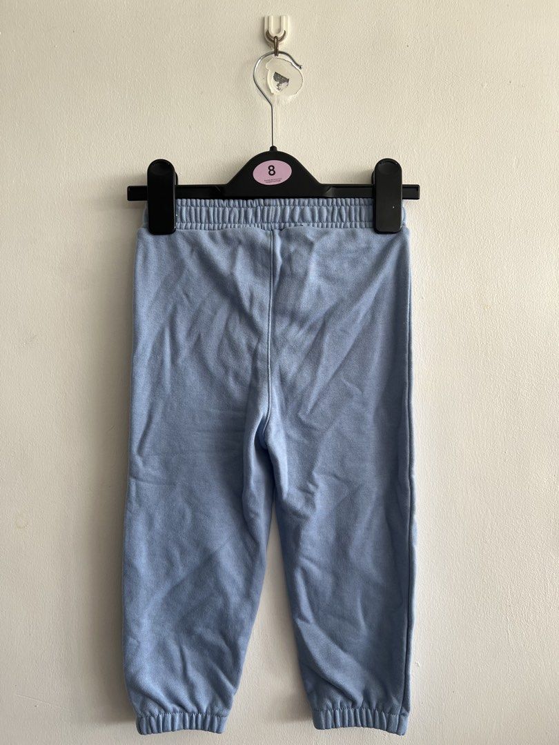 Primark Blue Sweatpants Size 24-36 Months (Category: Babies & Kids Fashion) located in Cainta. Submitted by thrift.reset (Listing ID 1422917766, Image 2). Description: Primark blue sweatpants. Size 24-36 months. Features elastic waistband and cuffs. Made in Cambodia. Minor pink mark present..
