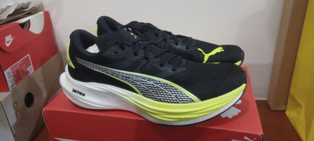 Puma Deviate Nitro 3 Wide Running Shoes (Category: Sneakers) located in Manila. Submitted by akoni_keoki (Listing ID 1423053426, Image 2). Description: - Puma Deviate Nitro 3 Wide running shoes - Color: Black and Yellow - Size: US 9.5, UK 8.5, EUR 42.5, 27.5 cm - Features white midsole with "NITRO" branding - Includes original box - Made in Vietnam.