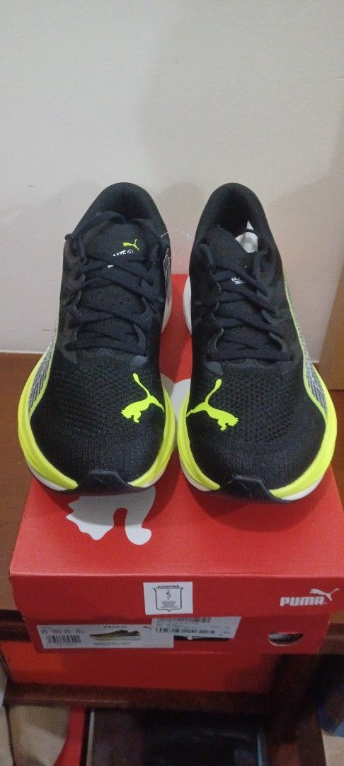 Puma Deviate Nitro 3 Wide Running Shoes (Category: Sneakers) located in Manila. Submitted by akoni_keoki (Listing ID 1423053426, Image 3). Description: - Puma Deviate Nitro 3 Wide running shoes - Color: Black and Yellow - Size: US 9.5, UK 8.5, EUR 42.5, 27.5 cm - Features white midsole with "NITRO" branding - Includes original box - Made in Vietnam.