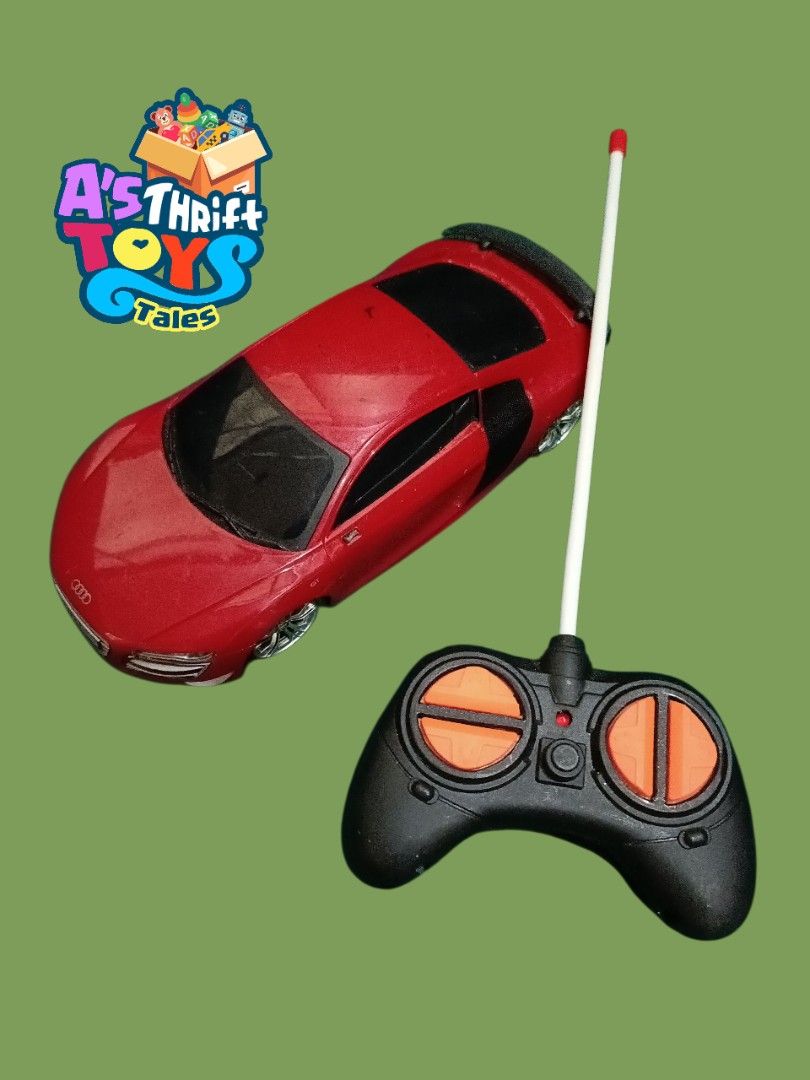 RC Car Assortment sold per piece (Category: Remote Control Toys) located in Iligan City. Submitted by shehabdor98515 (Listing ID 1423077490, Image 2). Description: - RC car collection - Available colors: black, silver, red, and orange stripe designs - Each car includes a remote control - Some remotes are branded "CMJ".