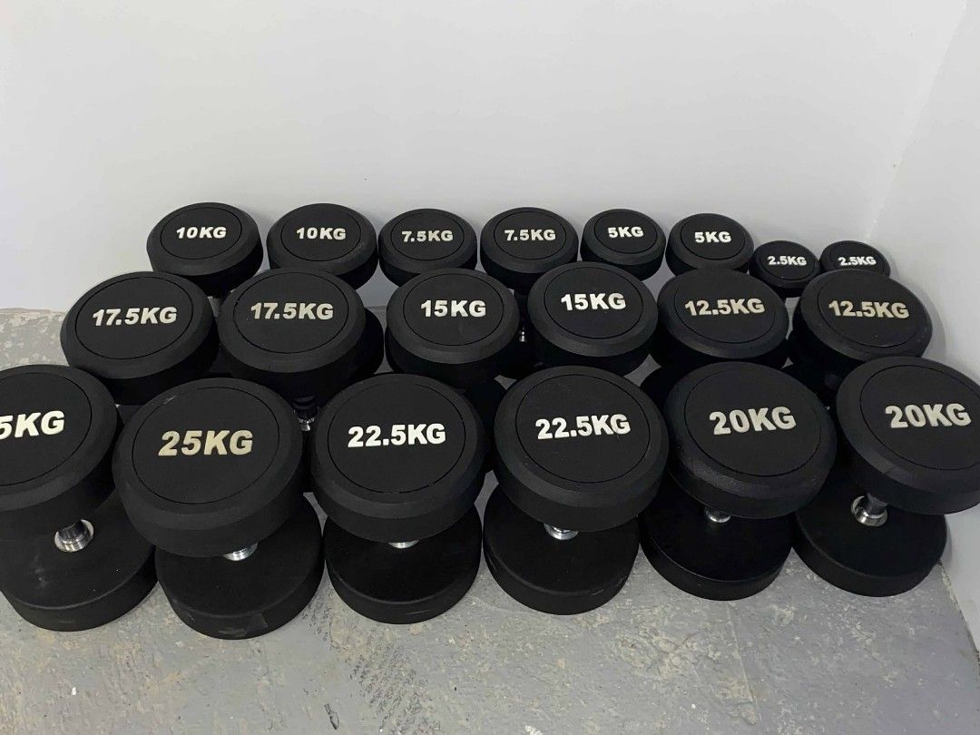 Rubber Dumbbell Set (Category: Weights & Dumbbells) located in Caloocan City. Submitted by protein888 (Listing ID 1422944728, Image 3). Description: Set of rubber dumbbells with various weights. Weights include 2.5kg, 5kg, 7.5kg, 10kg, 12.5kg, 15kg, 17.5kg, 20kg, 22.5kg, and 25kg. The dumbbells are black with white weight markings..