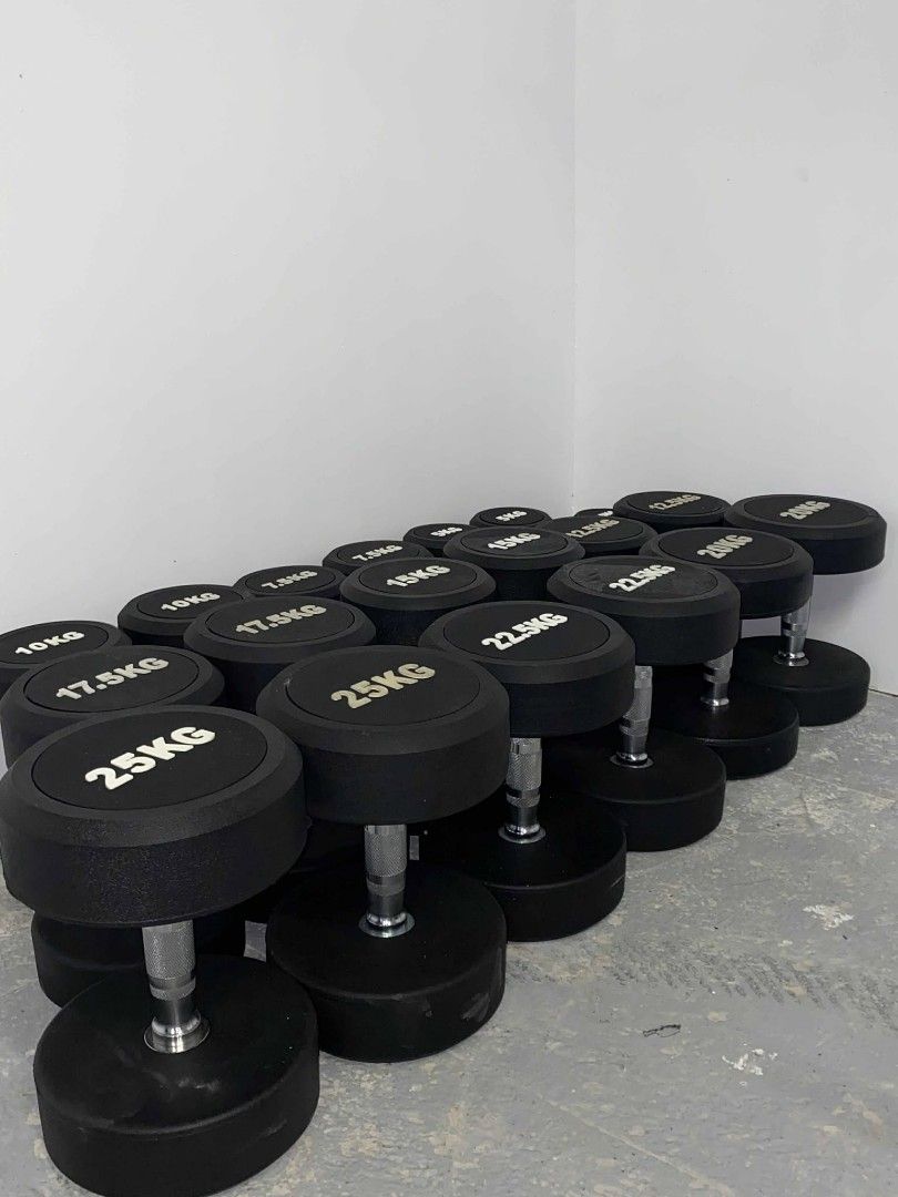 Rubber Dumbbell Set (Category: Weights & Dumbbells) located in Caloocan City. Submitted by protein888 (Listing ID 1422944728, Image 2). Description: Set of rubber dumbbells with various weights. Weights include 2.5kg, 5kg, 7.5kg, 10kg, 12.5kg, 15kg, 17.5kg, 20kg, 22.5kg, and 25kg. The dumbbells are black with white weight markings..