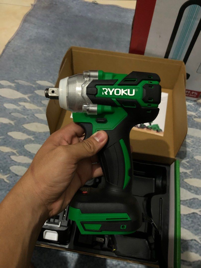 Ryoku 1/2" Drive Brushless Impact Wrench (Category: Construction Tools & Equipment) located in Pasay City. Submitted by sesi.g (Listing ID 1423025974, Image 3). Description: Ryoku 1/2" Drive Brushless Impact Wrench. Includes two 20V 2.6Ah batteries, charger, and manual. The impact wrench is green and black. The box indicates it is a cordless impact wrench. Model number is R-RBIW340-C2. makati location for pick up or delivery .