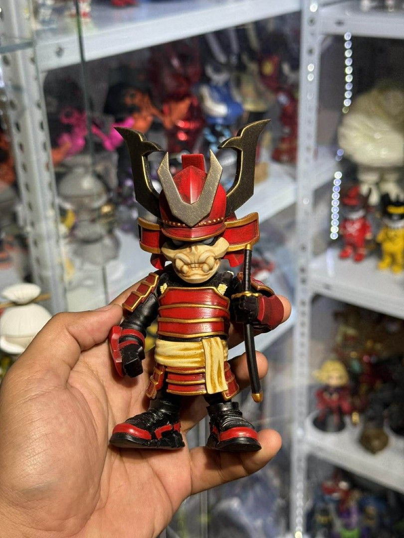 Solid Toys Samurai Figures (Category: Figurines & Statues) located in Manila. Submitted by erolljames50196 (Listing ID 1423064042, Image 3). Description: - Collection of Solid Toys Samurai figures. - Features various designs and unique color schemes. - Includes figures with samurai armor and helmets. - Some figures have a modern, stylized look. - Several figures are displayed with swords and other weapons. - A few figures have a skull-like appear