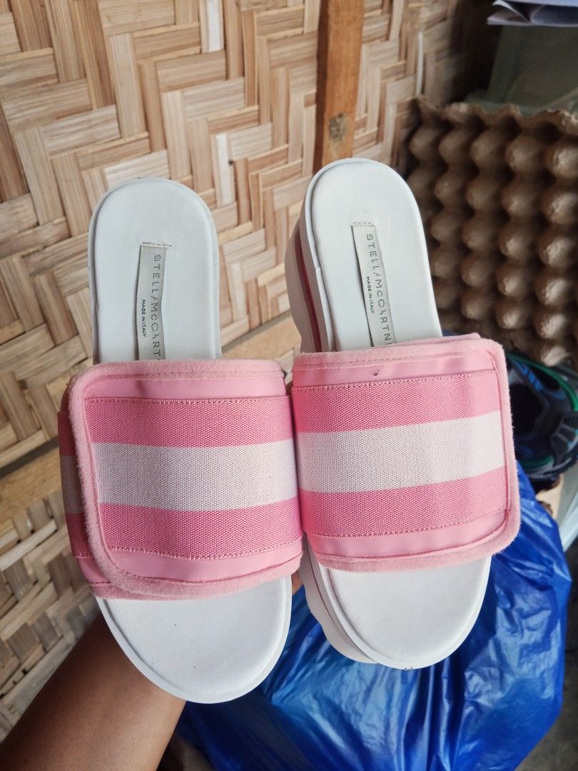Stella McCartney Platform Sandals (Category: Flats & Sandals) located in Zamboanga. Submitted by alminajammang19 (Listing ID 1423023300, Image 1). Description: - Stella McCartney platform sandals - Pink and white striped straps - White platform sole with ridged bottom - Made in Italy - White footbed with Stella McCartney logo.