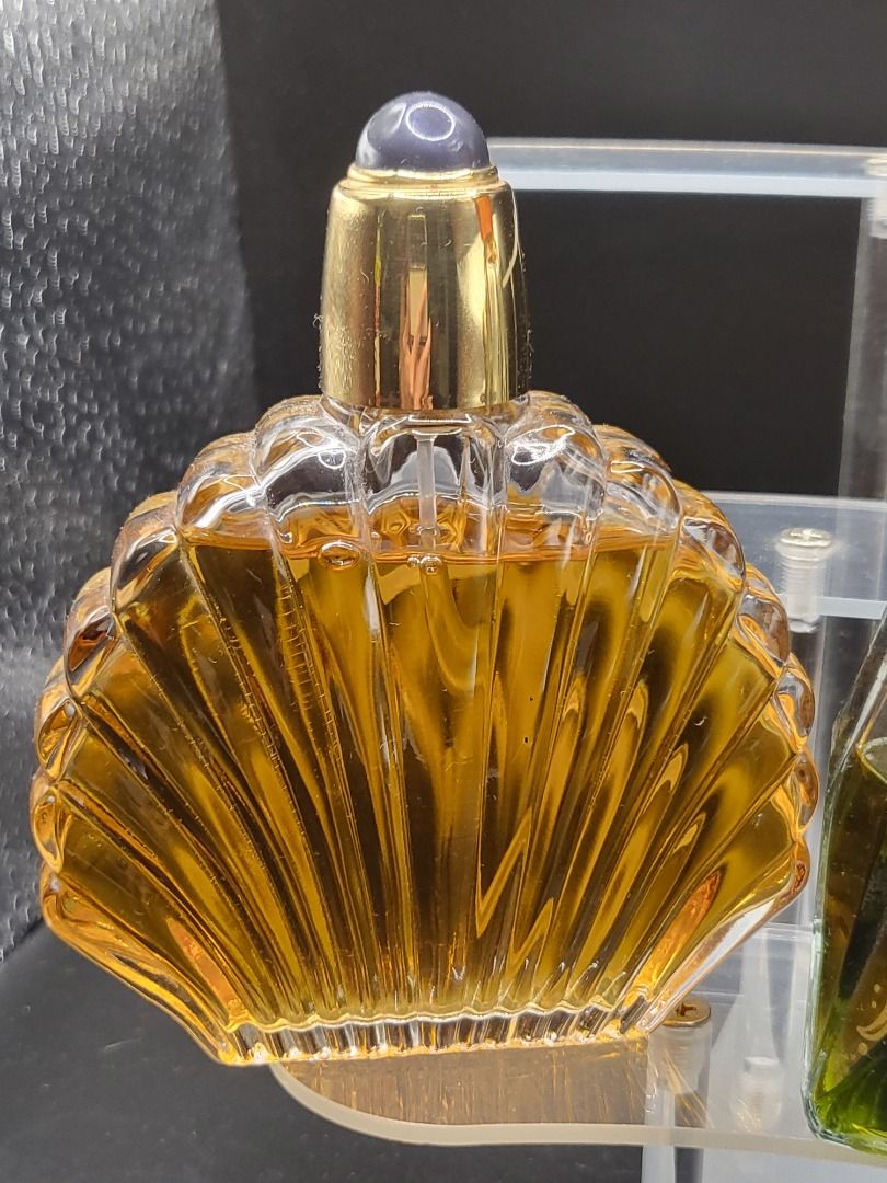 These three vintage PRE- OWNER perfumes offer a range of scent profiles from the 1950s to the 1990s. (Category: Fragrance) located in Sydney. Submitted by elv-02 (Listing ID 1423073856, Image 2). Description: These three vintage PRE- OWNER perfumes offer a range of scent profiles from the 1950s to the 1990s. Item description from the seller Black Pearls by Elizabeth Taylor 100ml Launched in 1996, this refreshing oriental floral scent is housed in