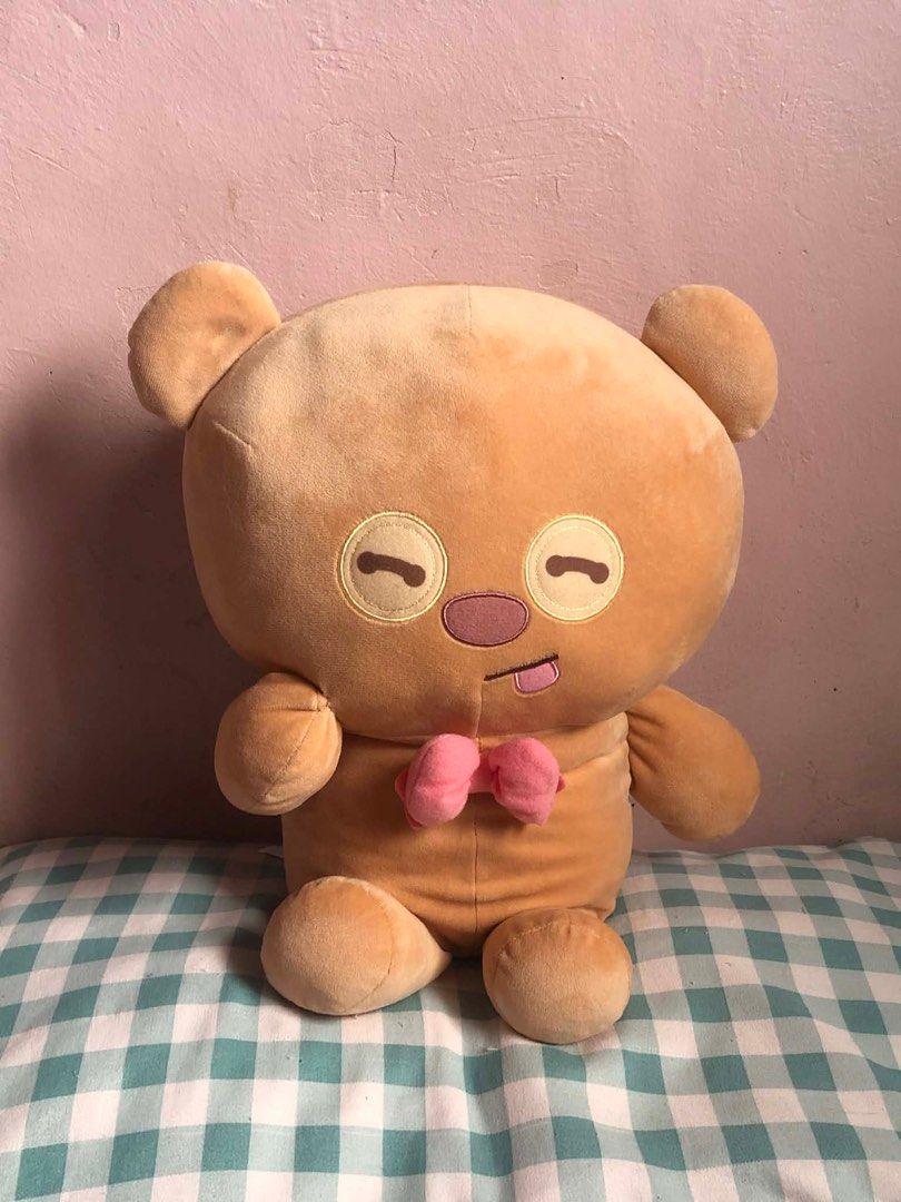 Tim Bear Brown Bear Plush Toy with Pink Bow (Category: Plushies & Soft Toys) located in Manila. Submitted by 102598iris (Listing ID 1422919101, Image 1). Description: - Cute brown bear plush toy - Features closed eyes and tongue sticking out - Adorned with a pink bow tie - Made of soft, plush material - Sitting down with a round body - Ideal cuddly companion.