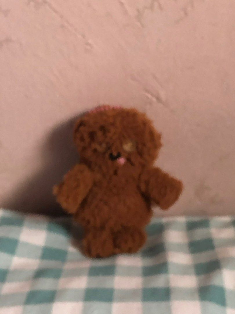 Tim Bear Brown Teddy Bear Plushie (Category: Plushies & Soft Toys) located in Manila. Submitted by 102598iris (Listing ID 1422913940, Image 2). Description: - Handmade brown teddy bear plushie - Features button eyes and a cute pink tongue - Adorned with a small pink beaded crown - Fluffy texture - Small and easy to carry - Ideal for collectors or as a unique gift.