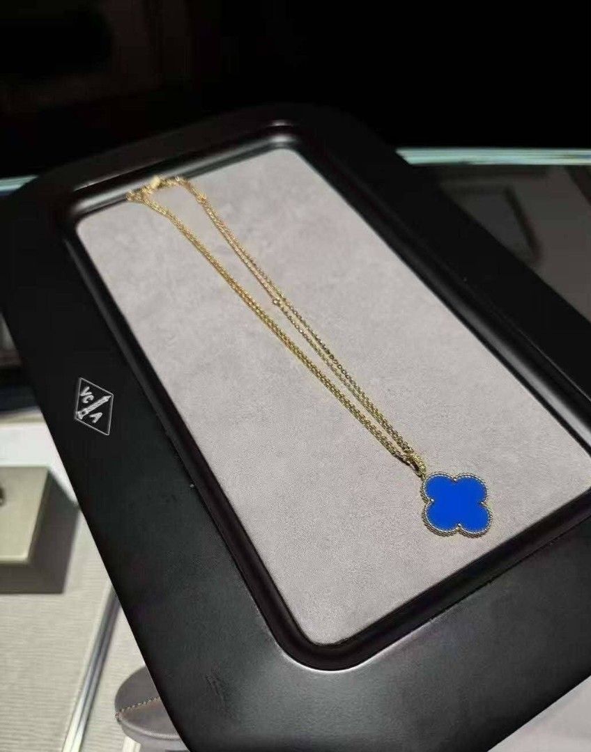 Van Cleef & Arpels Alhambra Necklace (Category: Necklaces) located in Manila. Submitted by alexclima15202 (Listing ID 1423073247, Image 3). Description: - Authentic Van Cleef & Arpels necklace - Clover-shaped pendant - Available colors: Red, Blue, White, Black - Elegant gold chain - Includes original box - Comes with original paperwork.