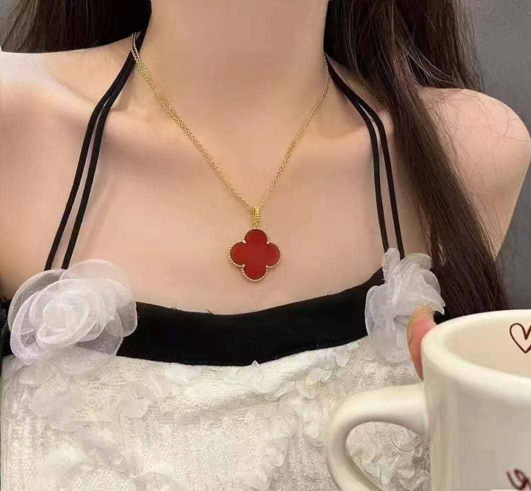 Van Cleef & Arpels Alhambra Necklace (Category: Necklaces) located in Manila. Submitted by alexclima15202 (Listing ID 1423073247, Image 2). Description: - Authentic Van Cleef & Arpels necklace - Clover-shaped pendant - Available colors: Red, Blue, White, Black - Elegant gold chain - Includes original box - Comes with original paperwork.