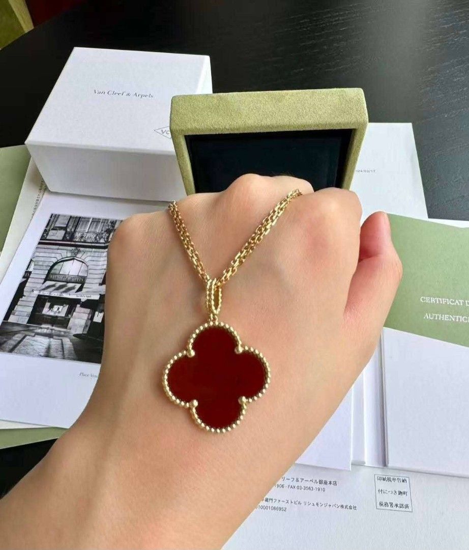 Van Cleef & Arpels Alhambra Necklace (Category: Necklaces) located in Manila. Submitted by alexclima15202 (Listing ID 1423073247, Image 1). Description: - Authentic Van Cleef & Arpels necklace - Clover-shaped pendant - Available colors: Red, Blue, White, Black - Elegant gold chain - Includes original box - Comes with original paperwork.