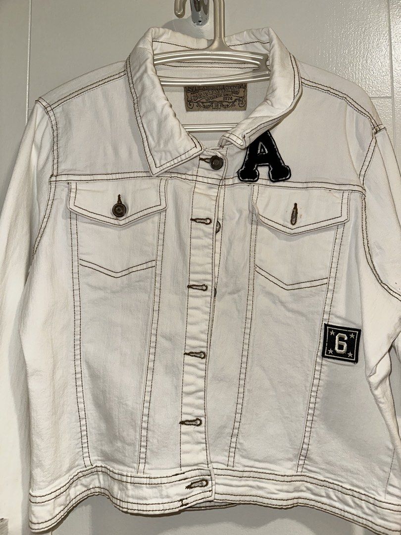Vintage White Denim Jacket with Patches (Category: Coats, Jackets and Outerwear) located in Taguig. Submitted by mommaskye (Listing ID 1423036959, Image 2). Description: - White vintage denim jacket - Thrifted and well loved - Some distressing but not noticeable when worn - Overall still VGUC and nice fit - All issues posted .