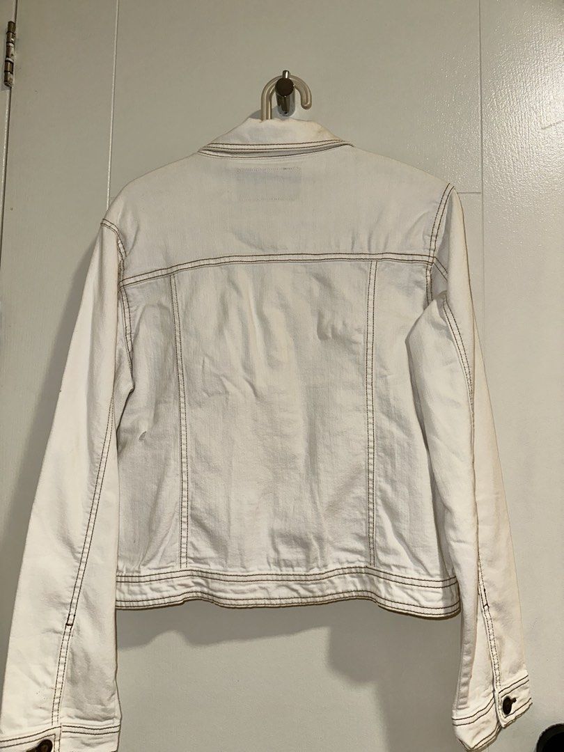 Vintage White Denim Jacket with Patches (Category: Coats, Jackets and Outerwear) located in Taguig. Submitted by mommaskye (Listing ID 1423036959, Image 3). Description: - White vintage denim jacket - Thrifted and well loved - Some distressing but not noticeable when worn - Overall still VGUC and nice fit - All issues posted .