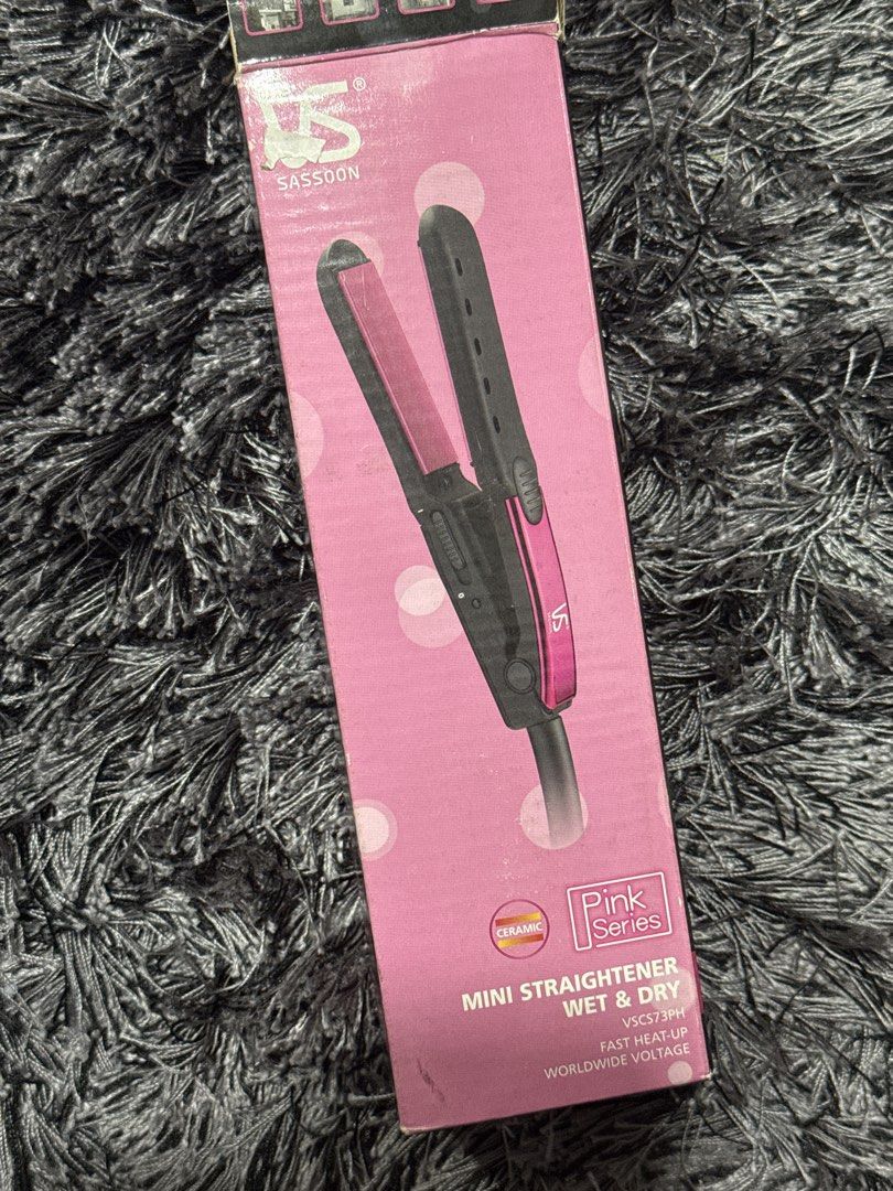VS Sassoon Pink Series Mini Straightener (Category: Hair) located in Taguig. Submitted by allthings.loved (Listing ID 1423040688, Image 1). Description: Mini Hair Straightener Wet & Dry Used once/ with box RFS: was gifted a dyson/decluttering SF C/o Buyer Loc: Makati.