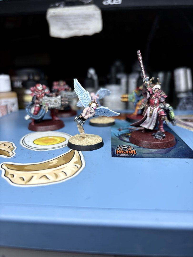 Warhammer 40k Adepta Sororitas (Category: Figurines & Statues) located in Quezon City. Submitted by pochminiatures (Listing ID 1422928362, Image 1). Description: - Hand-painted Warhammer 40k miniatures - Includes Adepta Sororitas - Detailed paintwork - Various poses - Equipped with bolters, chainswords, and other weapons - Textured base finishes - Perfect for Warhammer 40k enthusiasts and collectors 1 repentia squad -10 sisters - professionally p