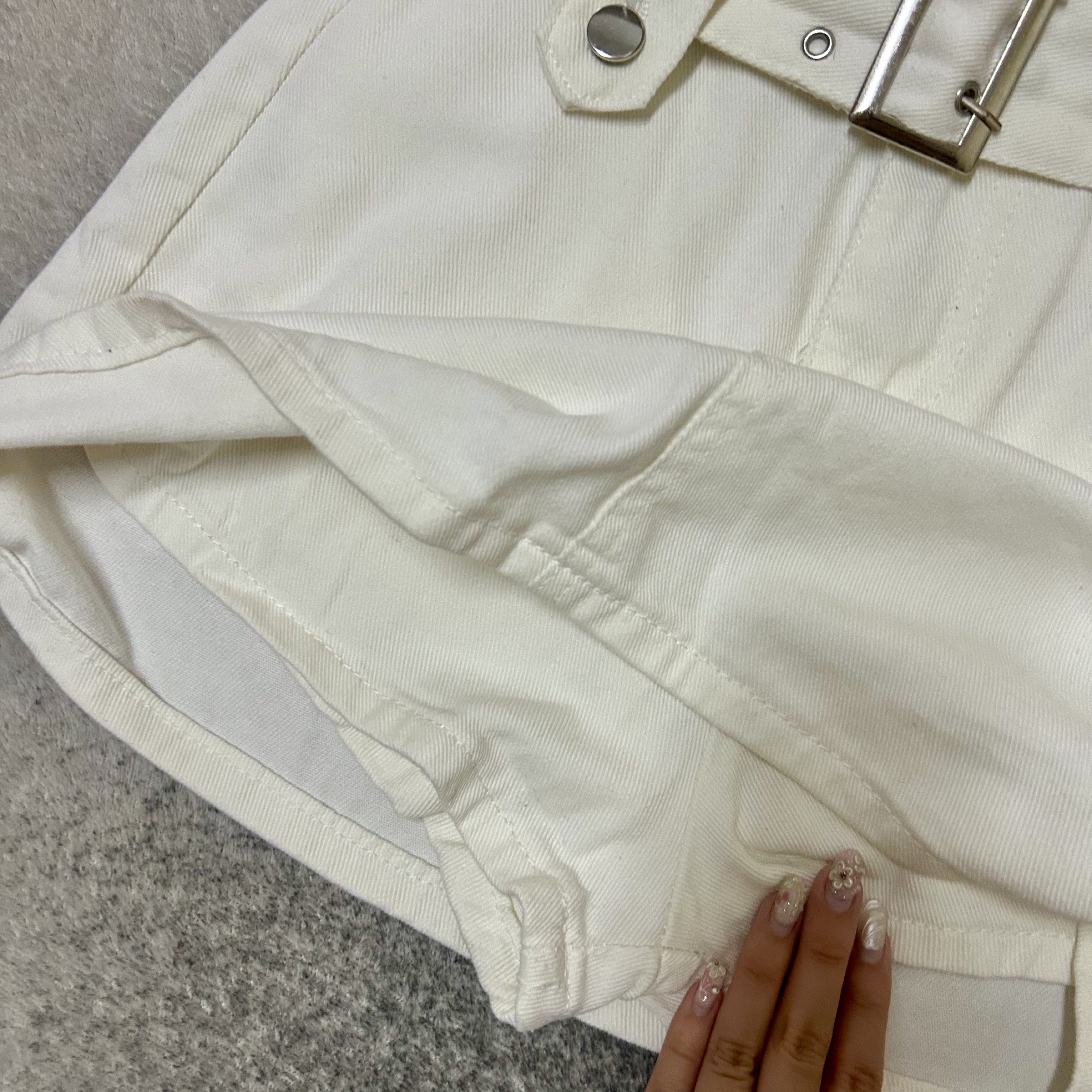 White Denim Skirt with Belt (Category: Skirts) located in Butuan. Submitted by ishinitially (Listing ID 1422906064, Image 3). Description: perfect for a chic outfit! ⋆˚𝜗𝜚˚⋆ used only once! - wide belt with silver buckle - high-waisted - two back pockets - has built in shorts fits small.