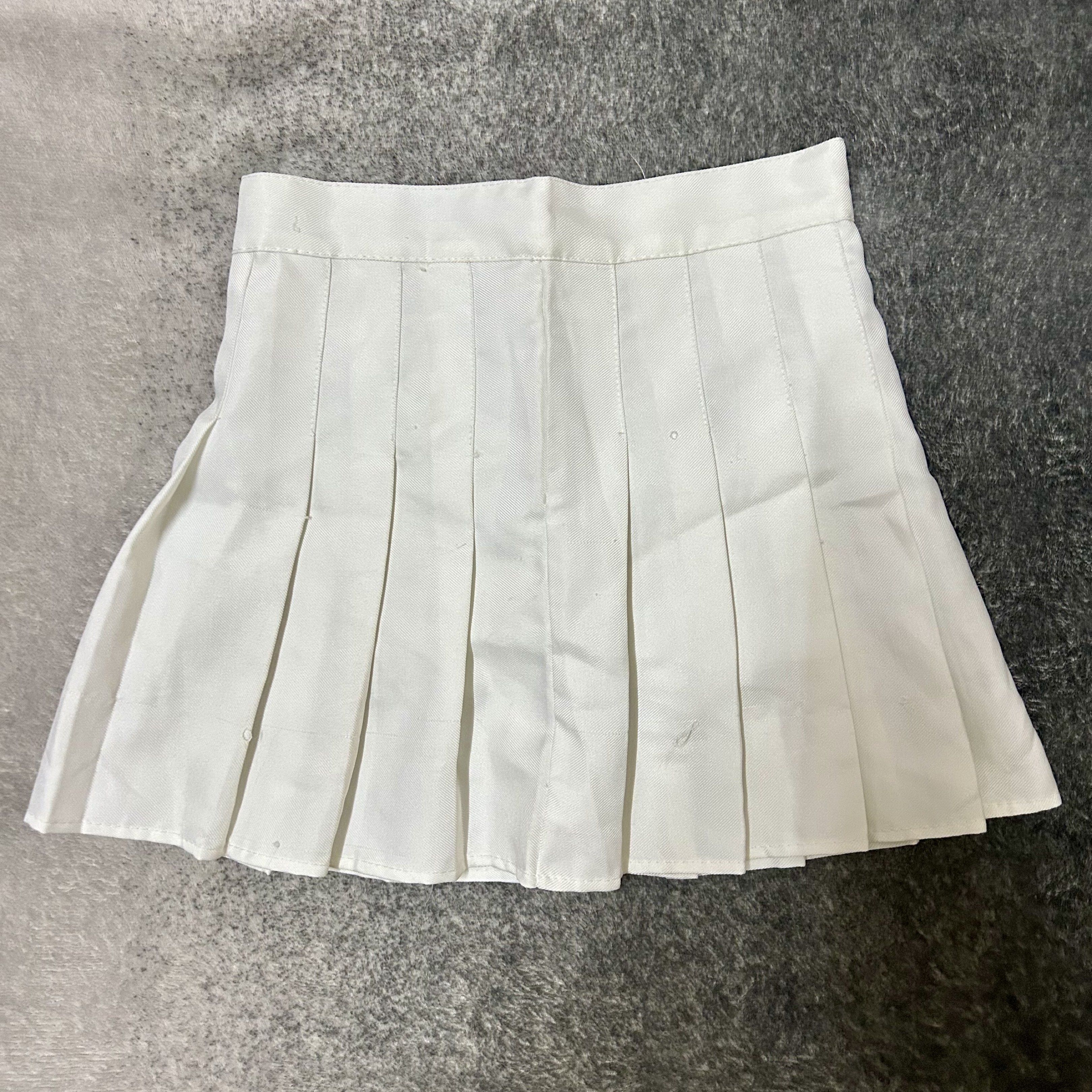 White Pleated Skirt (Category: Skirts) located in Butuan. Submitted by ishinitially (Listing ID 1422906749, Image 1). Description: - white pleated mini skirt ⋆˚𝜗𝜚˚⋆ - button closure - mini skirt style can fit s and m.