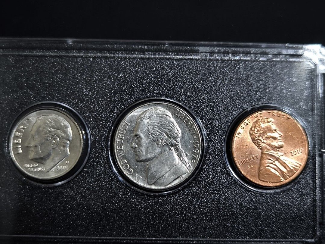 1996-2024 UNC 1 Cent to Half dollar coins set (possible error on 1 cent ) (Category: Currency) located in Paranaque City. Submitted by phcoincollective (Listing ID 1423221476, Image 3). Description: - Complete US coin set - Includes: - Half Dollar (1964) - Quarter (1996) - Dime (1996) - Nickel (1976) - Penny (2010) - Coins are housed in a protective case..