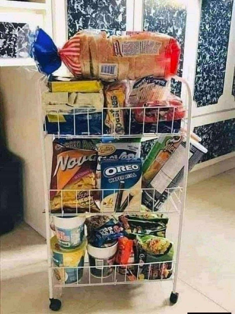 3-Tier Storage Cart (Category: Storage Boxes & Baskets) located in Manila. Submitted by lyfrancois14 (Listing ID 1423189200, Image 2). Description: 3-tier storage cart is perfect for organizing fruits, vegetables, snacks, and other items. It features a sturdy white frame with three wire baskets for easy visibility and access. The cart is on wheels for easy mobility. Ideal for kitchens, pantries, or any space needing extra storage..