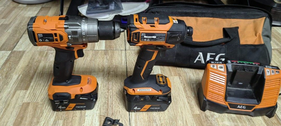 AEG Brushless Drill and Impact Driver Set (Category: Construction Tools & Equipment) located in Taguig. Submitted by roma2701 (Listing ID 1423145037, Image 3). Description: - AEG Brushless Drill and Impact Driver Combo - Includes: - Drill: A18PDB - Impact Driver: BSS18B6 - 2 x 18V 4Ah Batteries - Charger - Carrying Bag - Color: Black and Orange - Complete and Ready to Use.