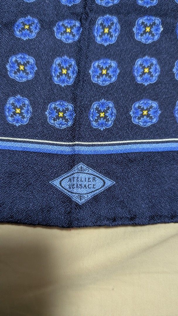 Atelier Versace blue silk medallion pocket square (Category: Luxury Accessories) located in Rizal. Submitted by sheitla (Listing ID 1423190000, Image 2). Description: 📍Lower Antipolo City Atelier Versace blue silk medallion pocket square featuring a glossy, hand-rolled finish. Used once lang, then na stock na. Excellent condition. .